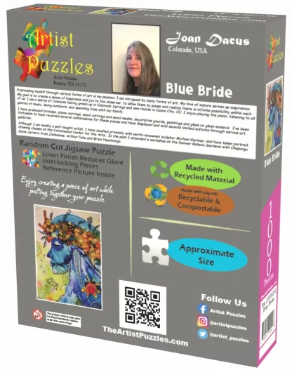 Box back of Artist Puzzles Blue Bride jigsaw puzzle. A picture of and bio info about the artist – Joan Dacus, a small pic of the puzzle, a pic of a puzzle piece showing the actual size of the pieces, social media links, and a QR code.