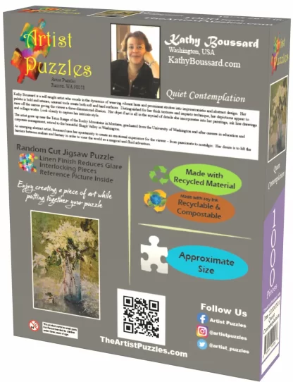 Box back of Artist Puzzles Quiet Contemplation jigsaw puzzle. A picture of and bio info about the artist – Kathy Boussard, a small pic of the puzzle, a pic of a puzzle piece showing the actual size of the pieces, social media links, and a QR code.